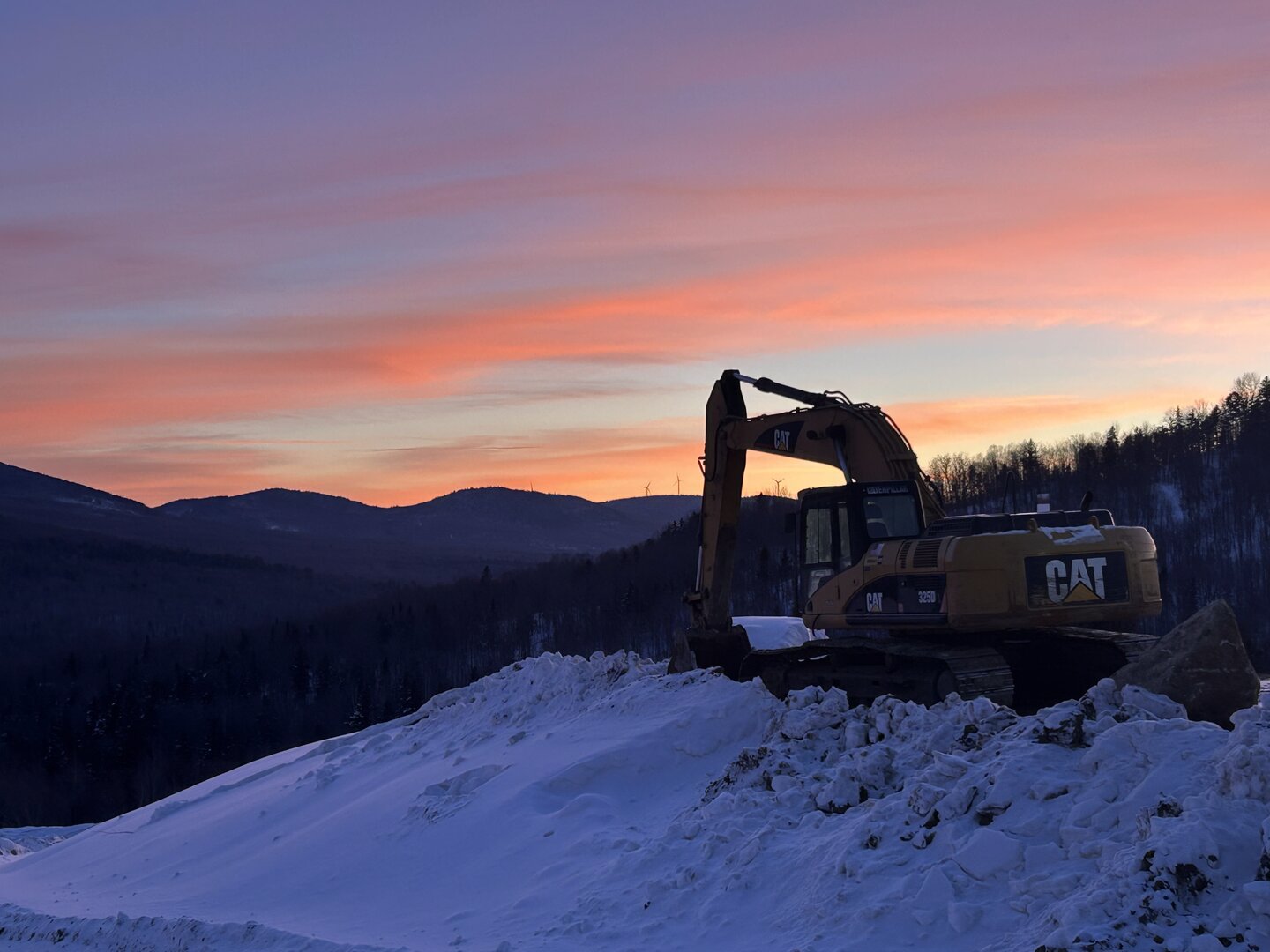 Snowmobile trail groomer at Bucky's Ridge