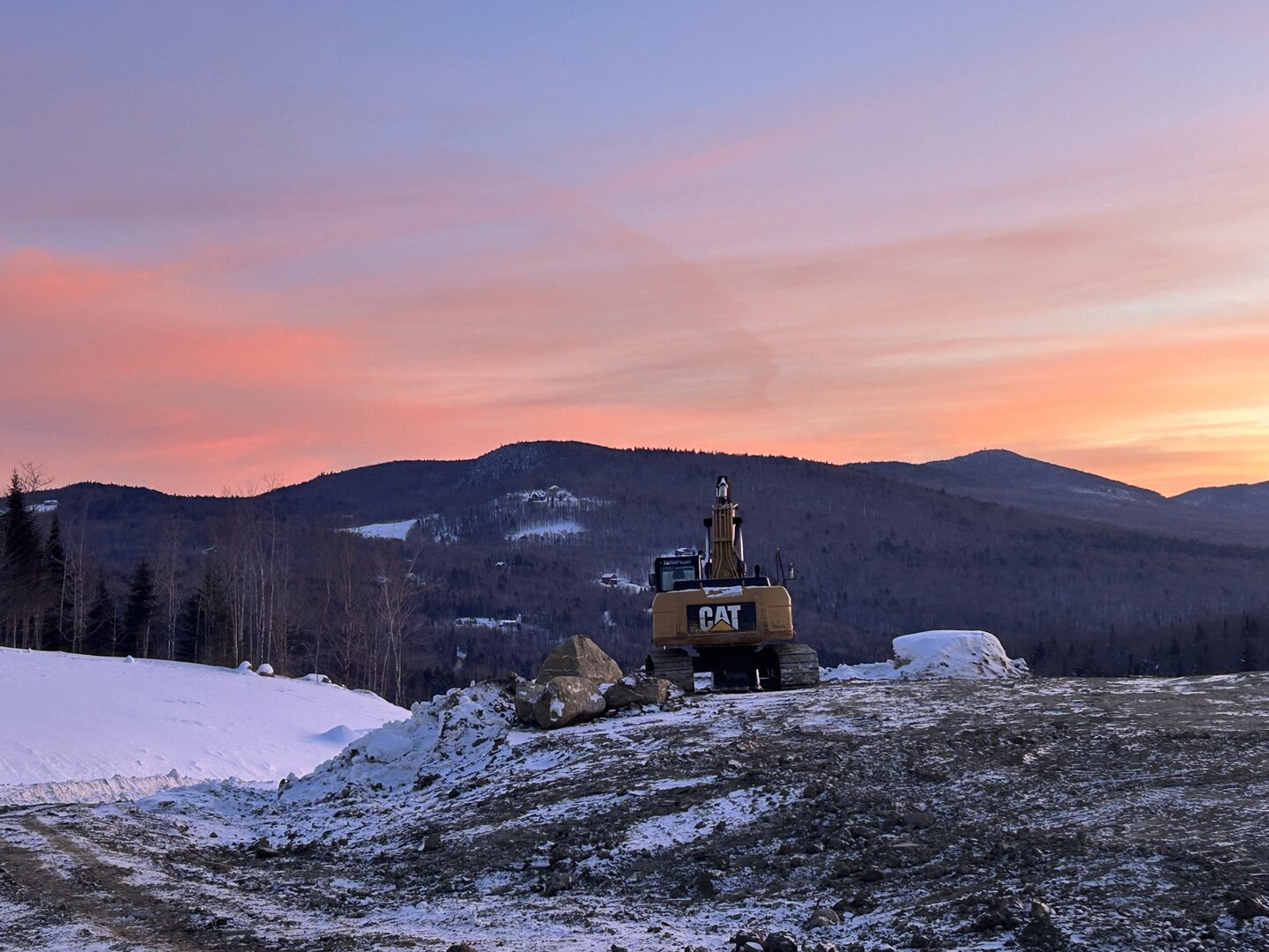 Trail groomer maintaining snowmobile trails at Bucky's Ridge