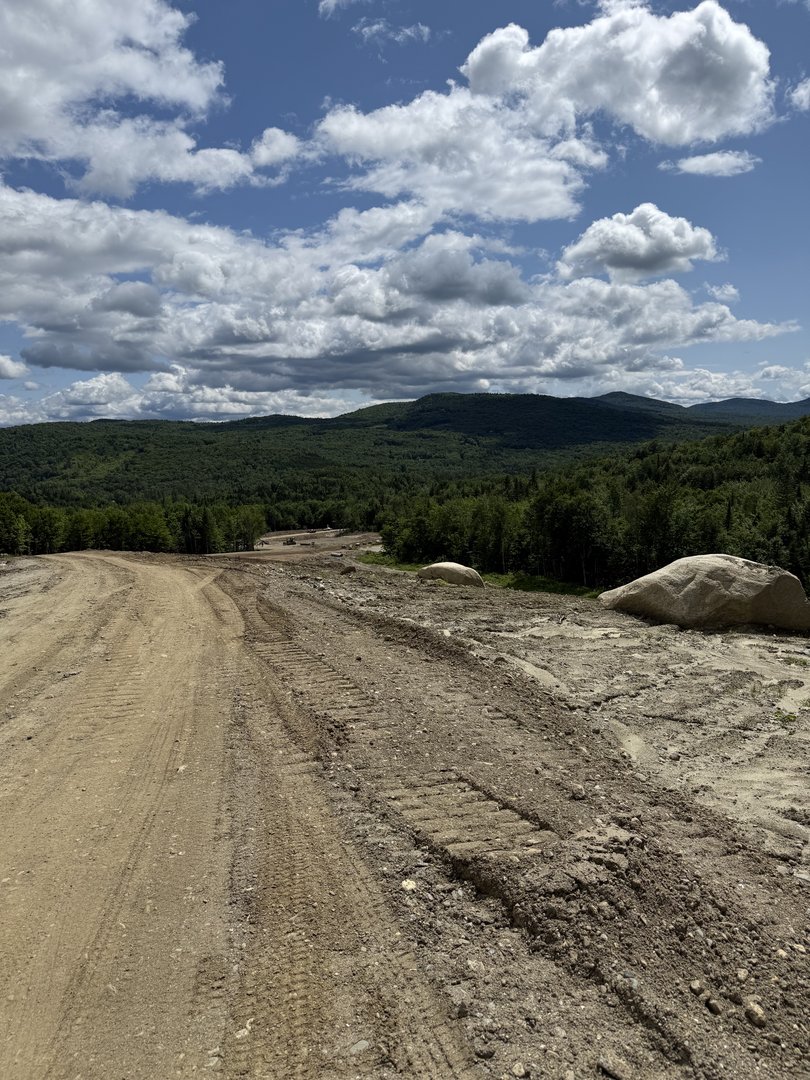 Development road with mountain views at Bucky's Ridge